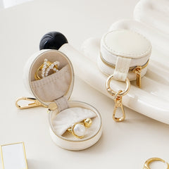 "Trésor de Poche – Mini Boîte à Bijoux pour Élégance Nomade"