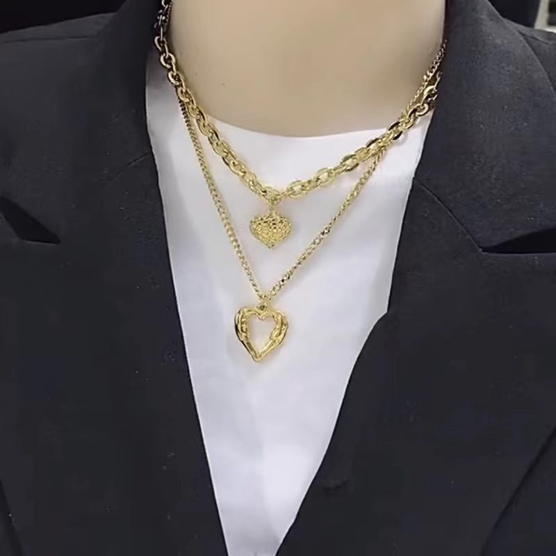 "Élan du Cœur – Collier Ailes d’Ange & Cœurs Entrelacés"
