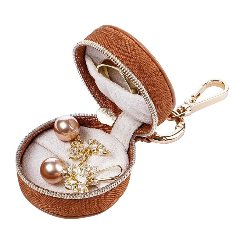 "Trésor de Poche – Mini Boîte à Bijoux pour Élégance Nomade"